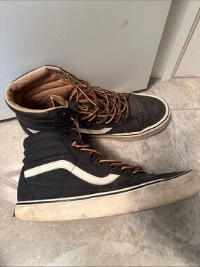 Vans Black High-Top Sneakers with White Stripe